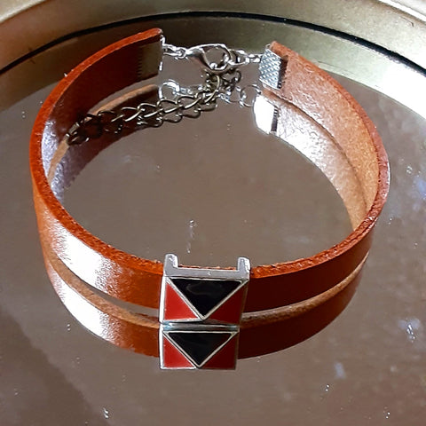 NOOK & CANDLE Jewelry Boutique Leather Strap Bracelet with Slide on charm and lobster clasp closure